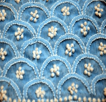 Intricate Murri stitch in Lucknowi Chikankari embroidery, featuring tiny knotted stitches that add texture and depth.