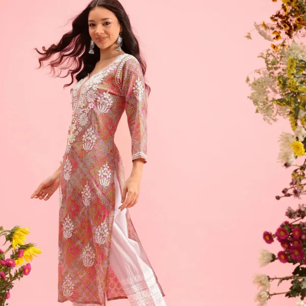 The Gulnaar Chikankari Kurta pairs a charming pink print with intricate hand embroidery on breezy mulmul cotton—designed for comfort, crafted for admiration.