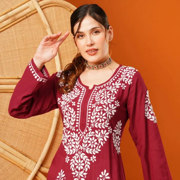 Bold and beautiful, this Maroon Modal Chikankari Kurta features intricate white hand embroidery on soft, breathable fabric — ideal for making a statement with ease.
