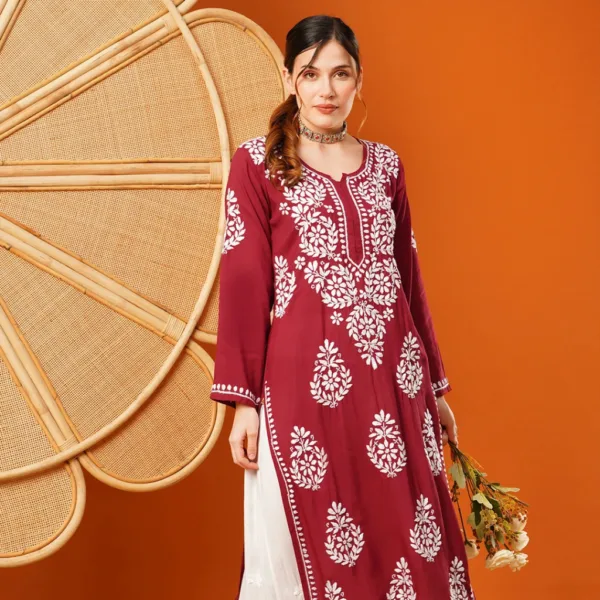 Bold and beautiful, this Maroon Modal Chikankari Kurta features intricate white hand embroidery on soft, breathable fabric — ideal for making a statement with ease.