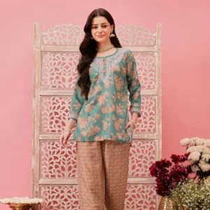 Stay effortlessly stylish with this Green Muslin Co-Ord Set, featuring delicate hand-embroidered Lucknowi Chikankari on a soft, breathable silhouette.
